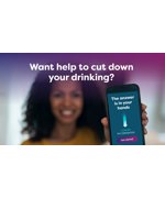 A woman smiling and holding up her phone.  The text above her reads "Want help to cut down your drinking?". The text on the phone reads "The answer is in your hands. Lower My Drinking. Get started" 